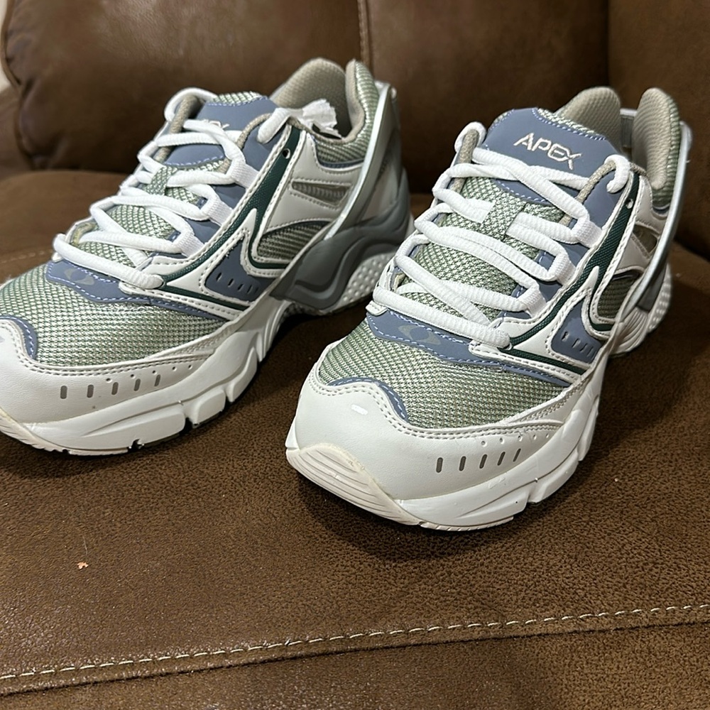 Women’s size 4.5 Apex Silver/Purple Runner. New in box.